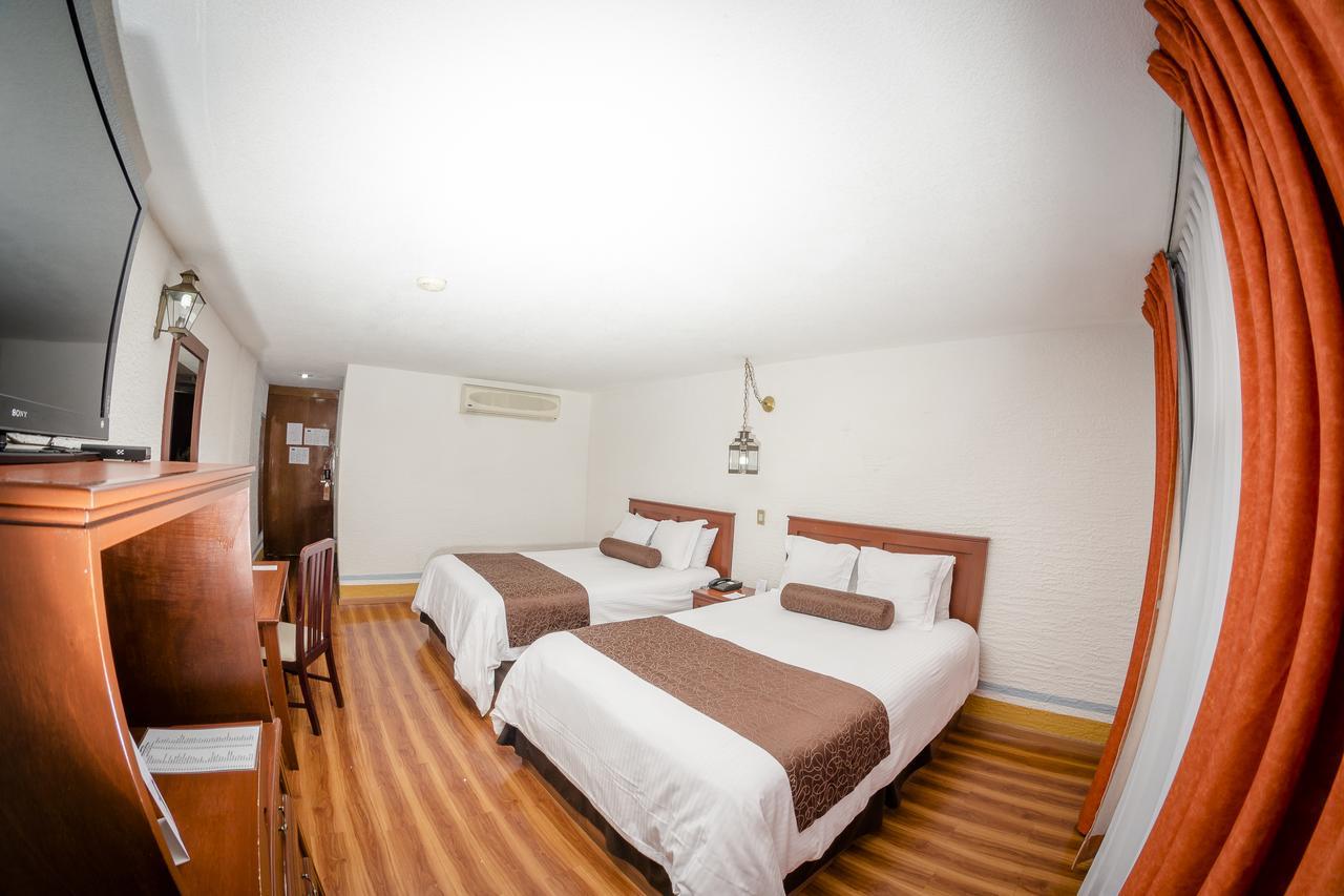 Howard Johnson By Wyndham Morelia Calle Real Esterno foto